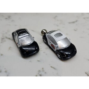 Pair of Geek Squad Volkswagen keychains
